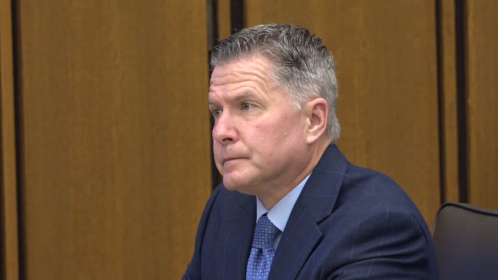 Divorce attorney accused of killing client claims the victim's ex-husband was interested in how to commit the 'perfect murder'