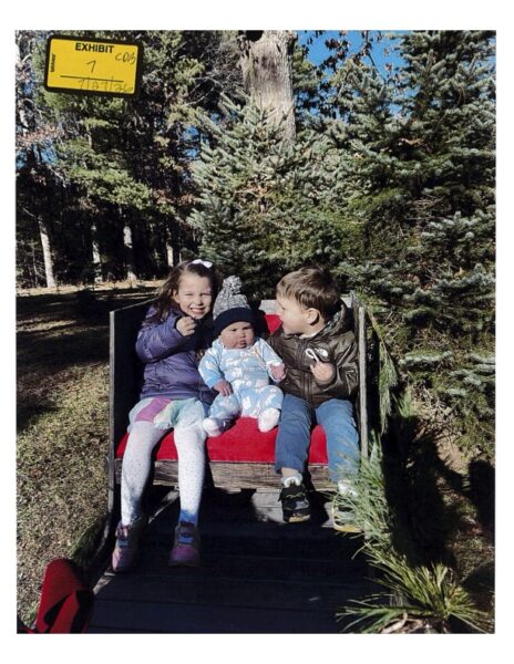Clancy children sit in a wagon