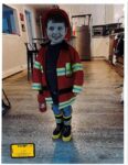 Dawson Clancy dressed as a firefighter