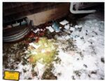 medical debris on ground outside house