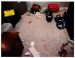 Medical debris is seen on the ground in the Clancy home's basement. (court exhibit)