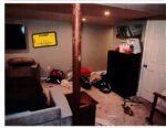 Medical debris is seen on the ground in the Clancy home's basement. (court exhibit)