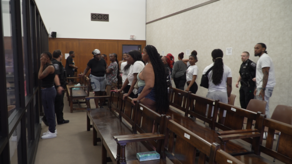 upset people in courtroom gallery