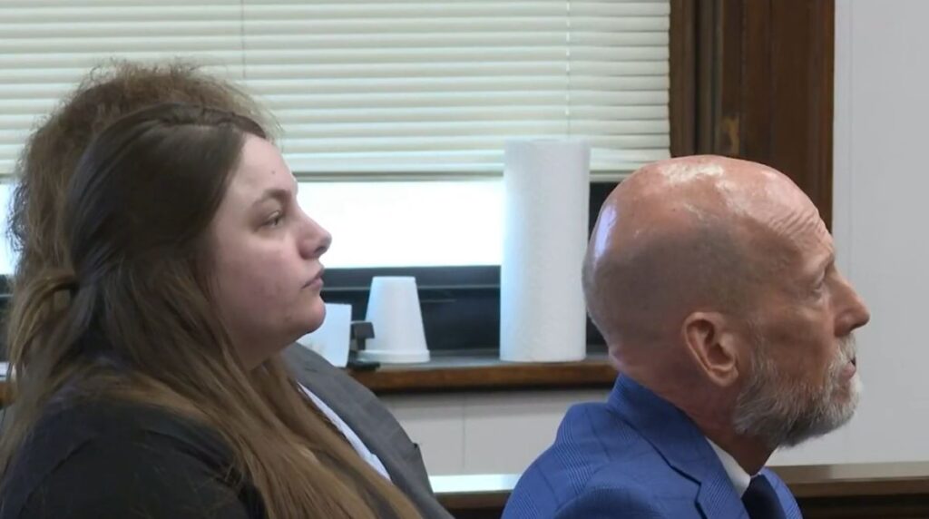 'Tilted like she's dying': Woman accused of beating her boyfriend's teething 19-month-old for biting her finger is facing trial for a 2nd time