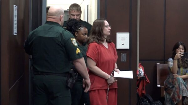 Woman accused of killing man found naked and dismembered under concrete facing new charges