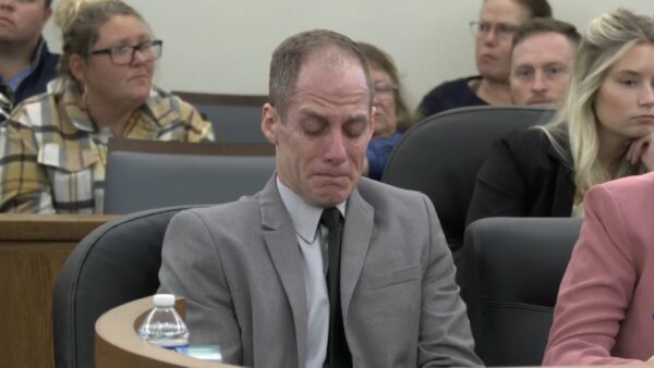 Caleb Flynn cries in court