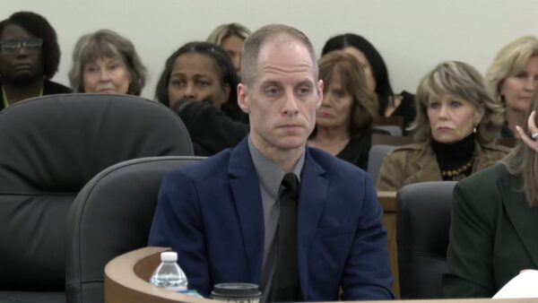Caleb Flynn sits in court