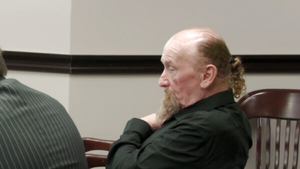 James Elmore sits in court