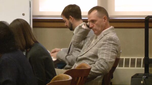 Timothy Hauschultz sits in court