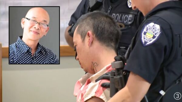 Man accused of confessing to killing his father and stepmother carried into court by deputies